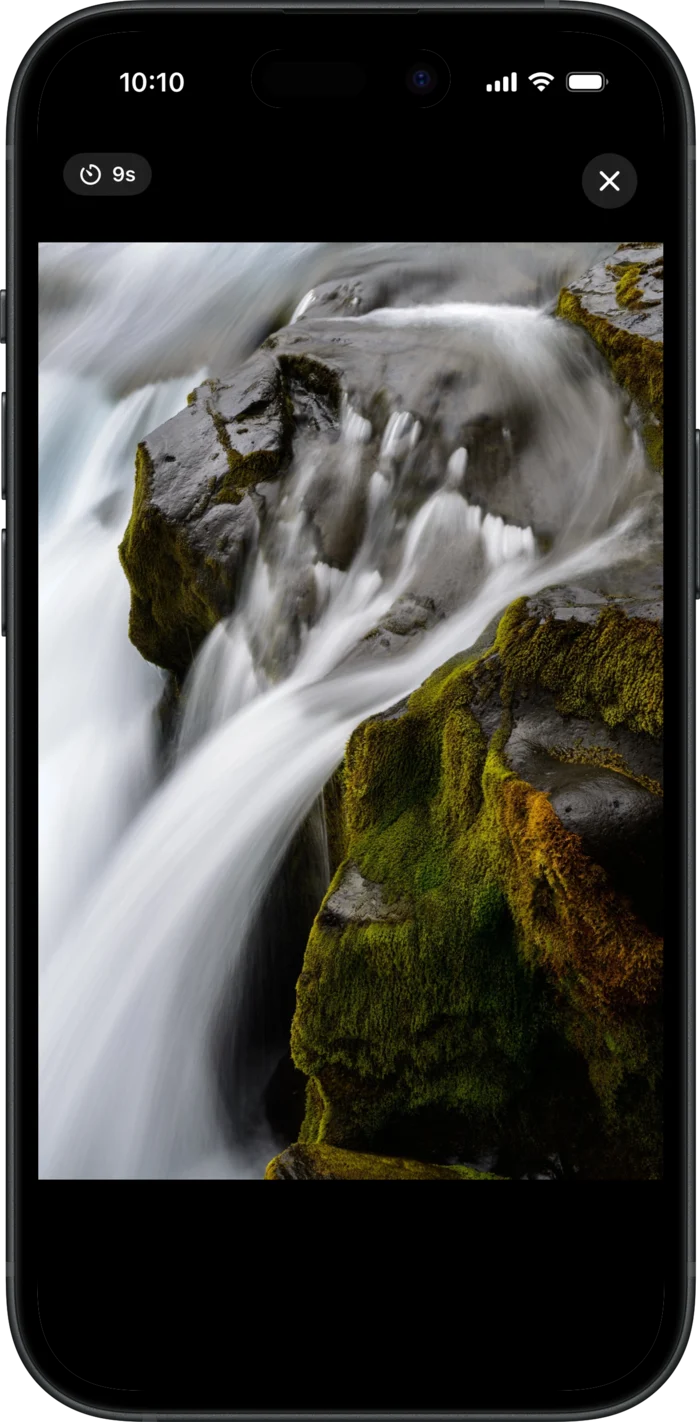 An opened view-once photo filling the screen with a nine-second timer in the top corner and a close button.